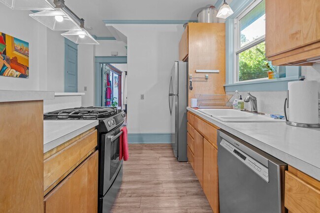 Building Photo - Charming Sabin Craftsman with Fenced Yard, Deck, and More!