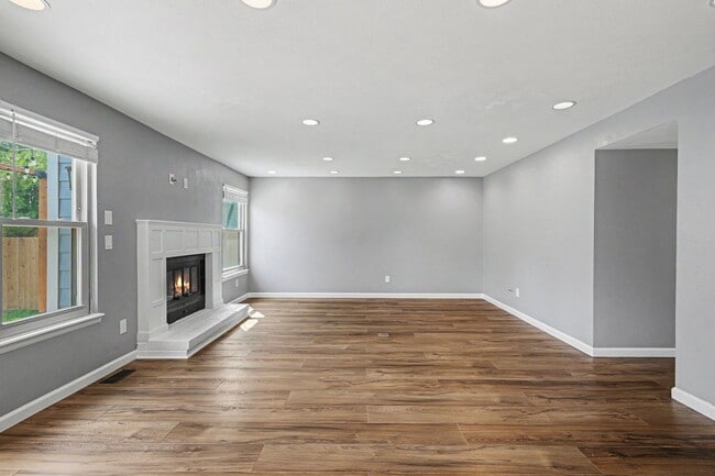 Building Photo - Updated 4BR Corner Lot Home with Finished Basement & 2-Car Garage