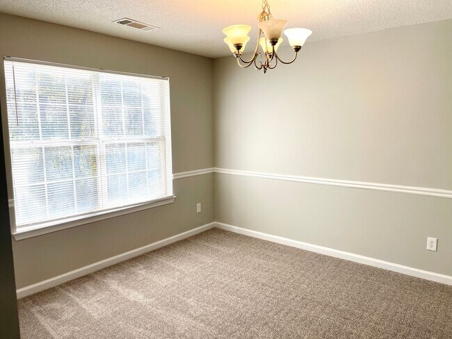 Building Photo - Welcome to this charming 3-bedroom, 2.5-ba...