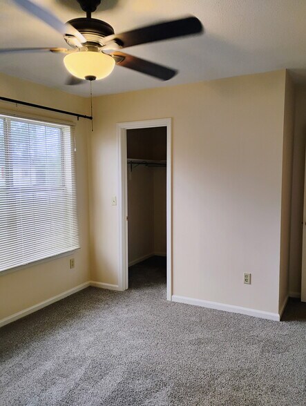 Bedroom 1 with walk in closet - 4725 Bayfield Dr