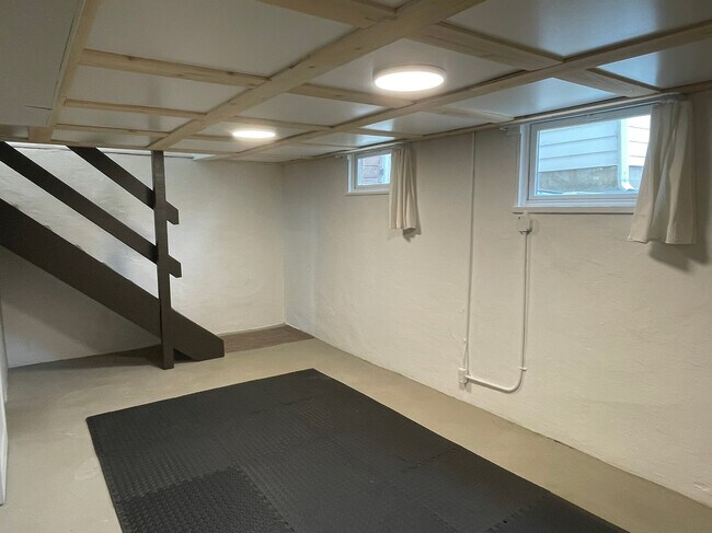 Finished basement bonus room with large windows - 3209 Atwood Ave