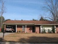 Building Photo - THREE BEDROOM, TWO BATH