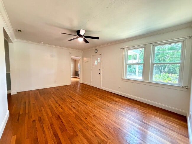 Building Photo - Historic Downtown Charm | Original Floors | Walk to Golf, Dining, Parks, & Concerts