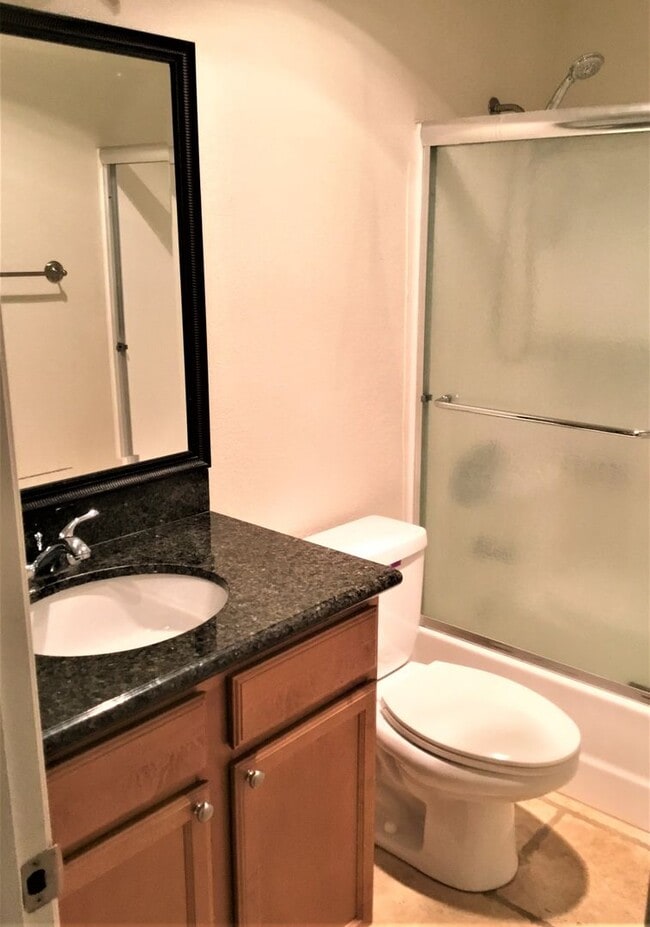 Building Photo - Studio at Baywood Villas