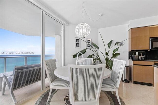 Building Photo - 18671 Collins Ave