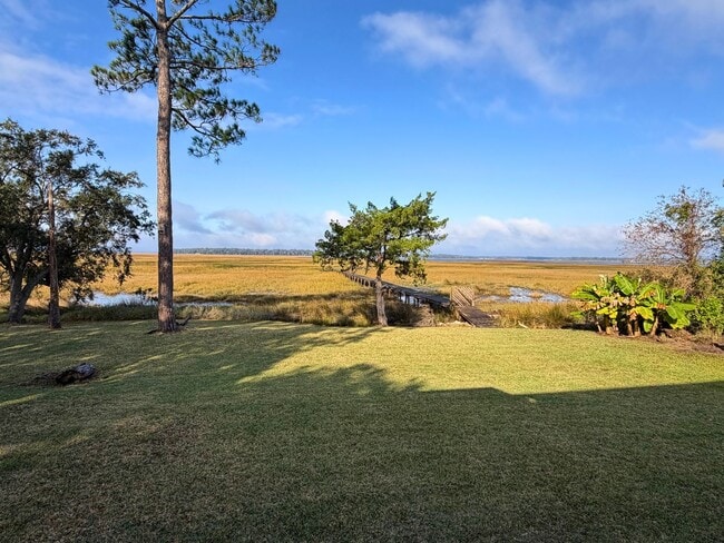 Building Photo - Spacious 4 Bedroom, 2.5 Bath Home with Stunning Marsh Views