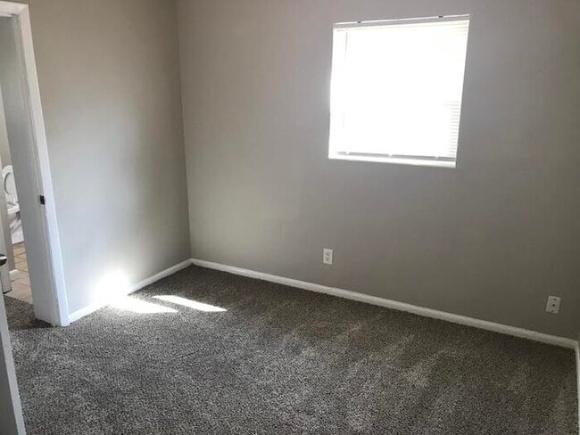 Building Photo - Spacious 4 Bedroom Home With Garage And Modern Updates