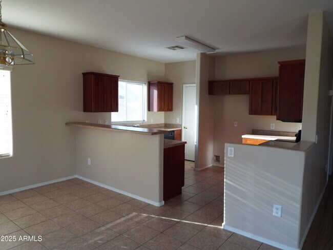 Building Photo - 24002 W Lasso Ln