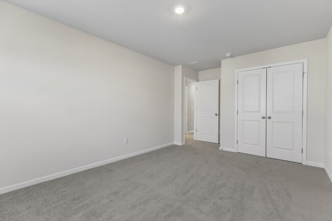 Building Photo - Brand-New 4-Bedroom/3-Full Bathroom Townho...