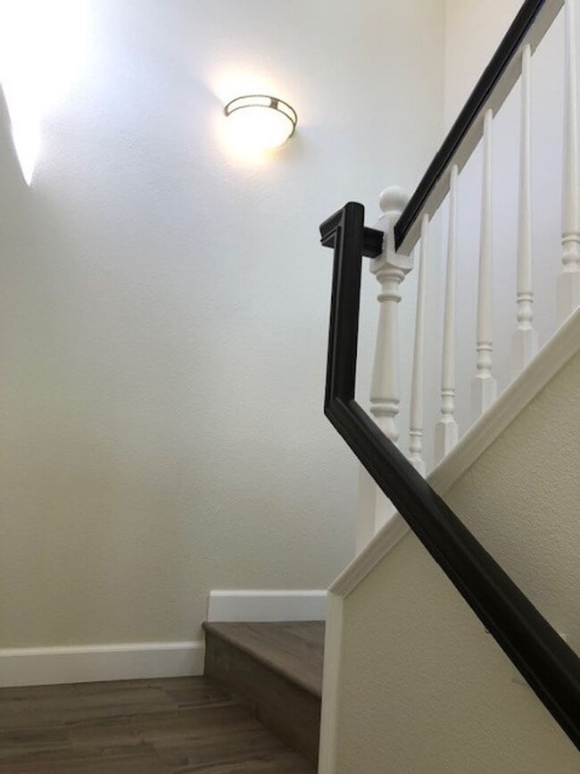 Building Photo - PICTURE PERFECT 2 BR/2 BATH PLUS LOFT END UNIT CONDO WITH DIRECT ACCESS 2 CAR GARAGE