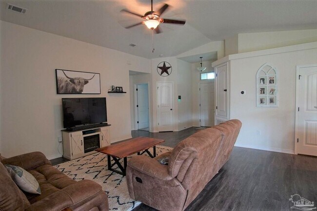 Building Photo - Popular Floor Plan, Almost New Home in Woo...