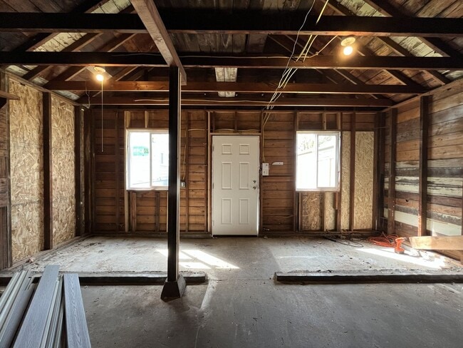 Building Photo - Expansive 4BR 2,900+ Sq Ft Home with Theater-Style Living Room & Bonus Hobby Workshop