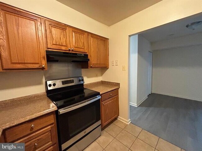 Building Photo - Charming Edsall Bluff Condo: Your Alexandria Oasis