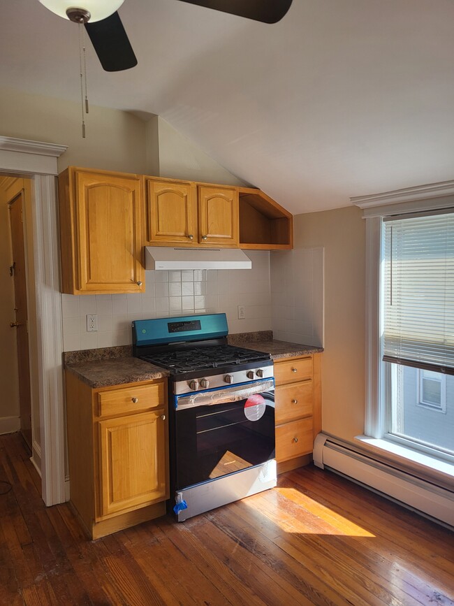 Kitchen w new stove - 256 Jewett Ave