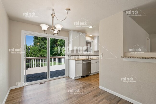 Building Photo - 2211 E 49th Ave