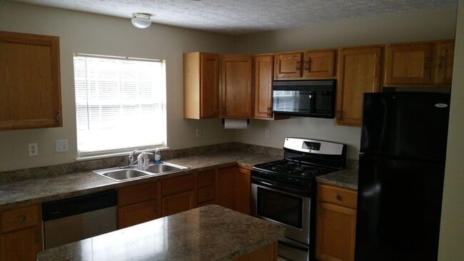 Building Photo - Spacious 3BR Townhouse in Sought-After Constant Friendship – Minutes to Everything!