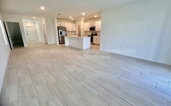 Building Photo - 8406 Blue Wave Ln E