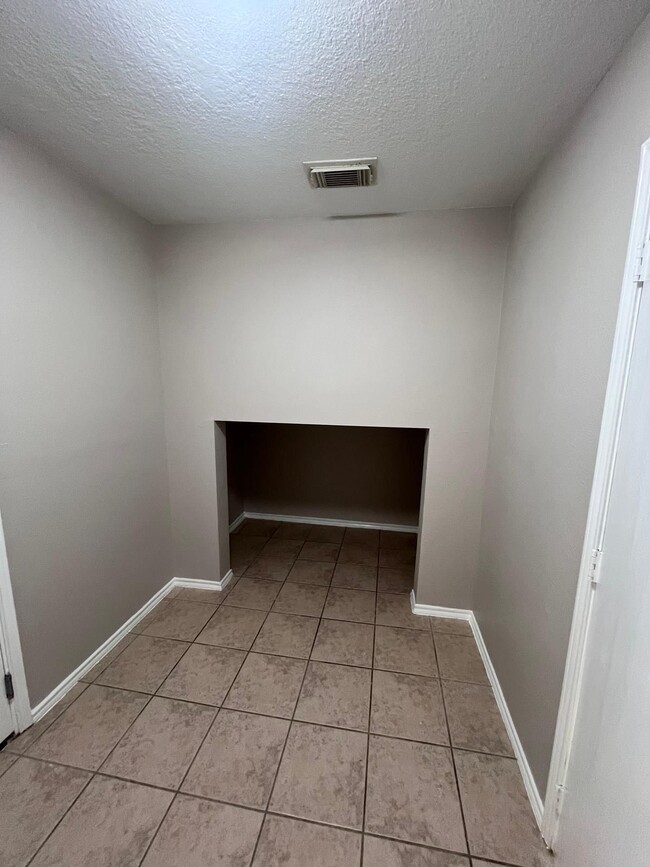 Laundry room storage - 4811 Pebble Bluff Ln