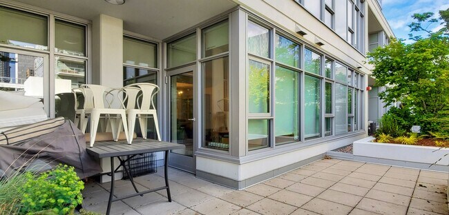 Building Photo - One of kind 7th terrace unit in reputable ...