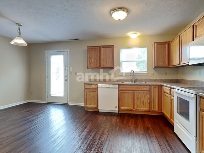 Building Photo - 10660 Brighton Knoll Pky N