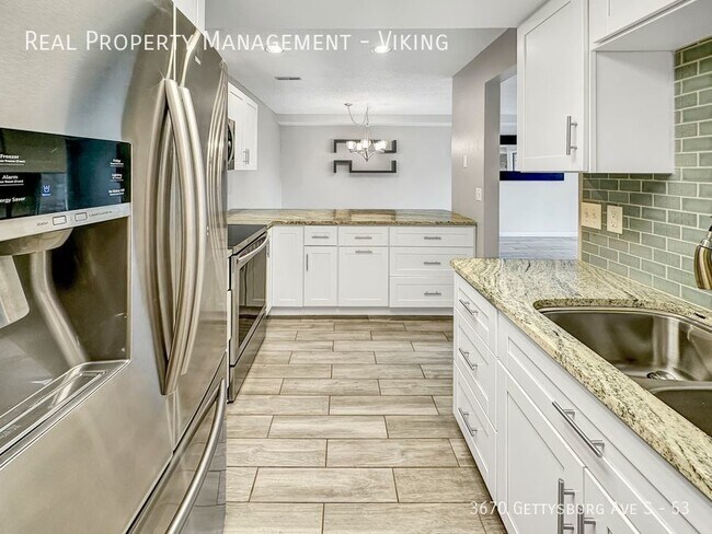 Building Photo - Renovated 2 Bed 1.5 Bath 1 Car Garage! - D...