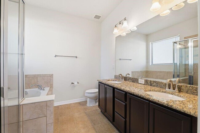 Building Photo - 9004 Mountain Magnolia Dr