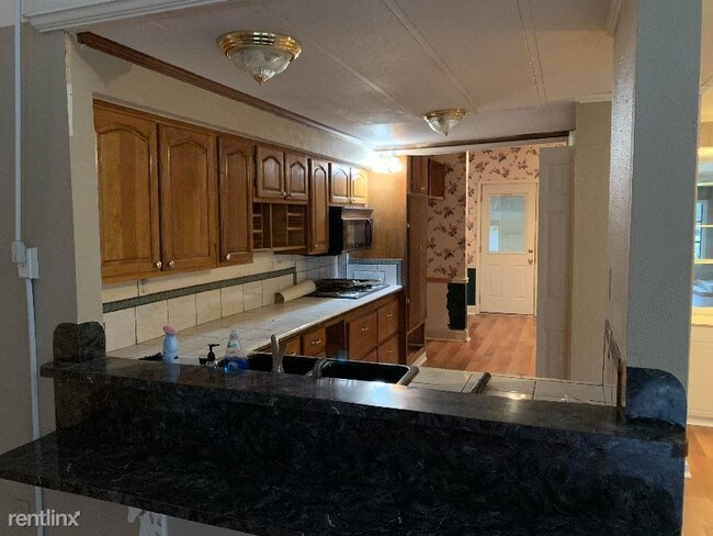 Building Photo - 18819 Greenwell Springs Rd