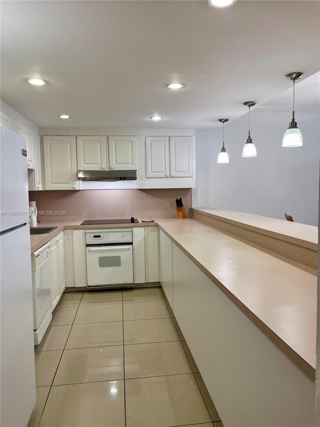 Building Photo - 19390 Collins Ave