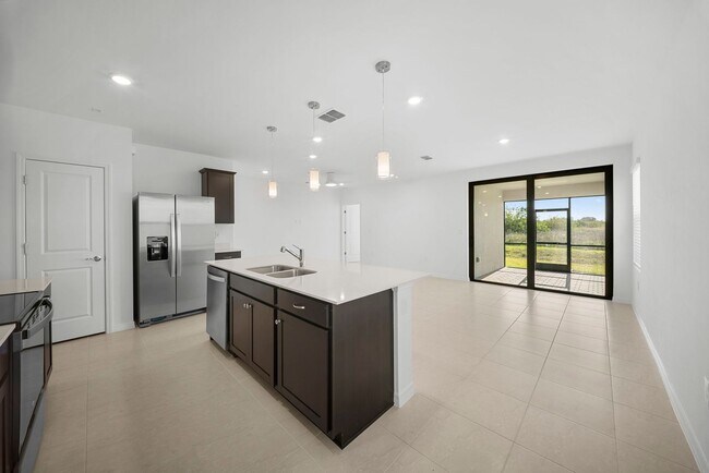 Building Photo - Newly constructed property offers four spacious bedrooms, two full bath in Lehigh Acres