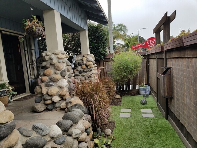 Front Yard (house has been painted) - 257 Windward Ave