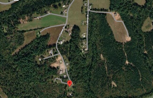 Building Photo - Spacious 4-Bedroom Rural Home on Private Acreage