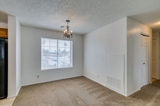 Building Photo - Charming Second-Floor Condo with Two Bedrooms and Fireplace