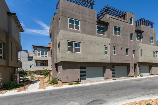 Building Photo - Stunning 4-Level Townhome in Inspirada | R...