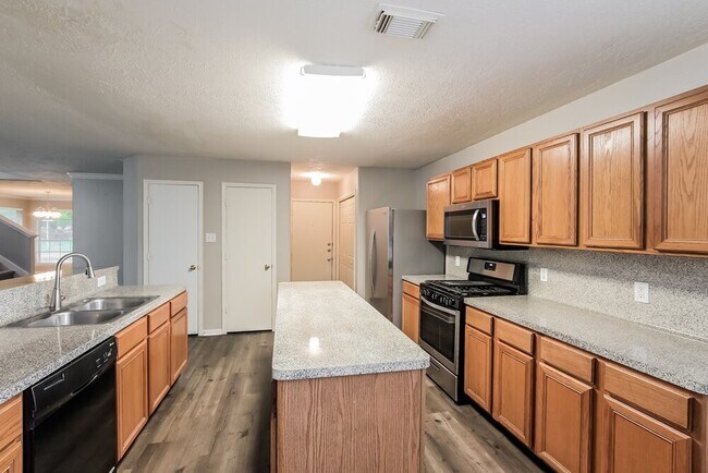 Building Photo - 6602 Bluebottle Ln