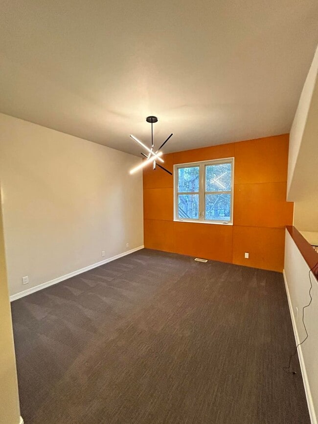 Building Photo - Modern 2-Bedroom Condo with Loft & 2 Car Garage!