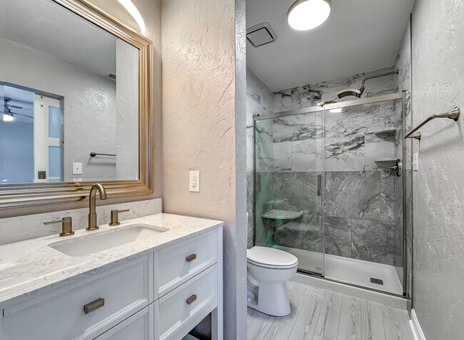 Building Photo - MODERN & Redone 1/1 w/ Tile Floors Throughout, Stainless Appliances, Granite Counters, Washer/Dry...