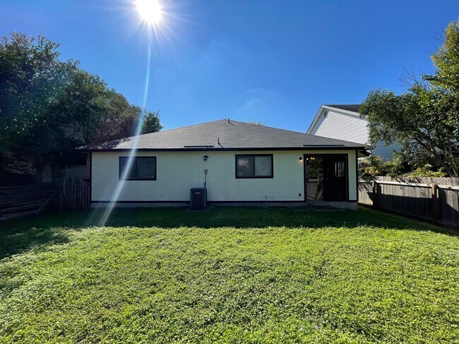 Building Photo - NICE 3 BEDROOM FEATURING AN ISLAND KITCHEN...