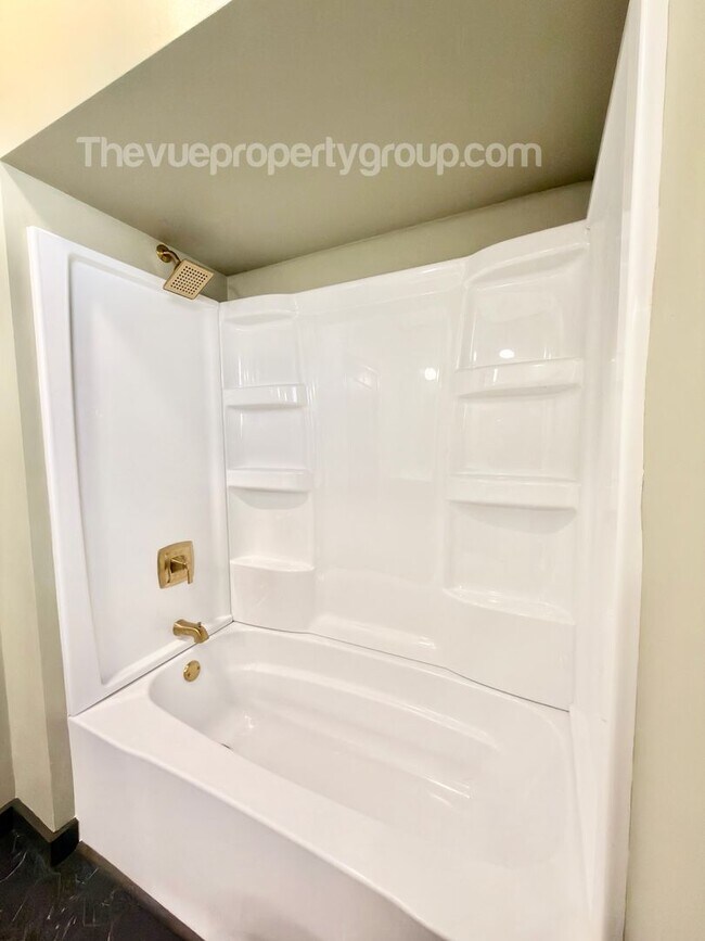 Building Photo - Charming Three-Bedroom with Garage & Fenced Yard