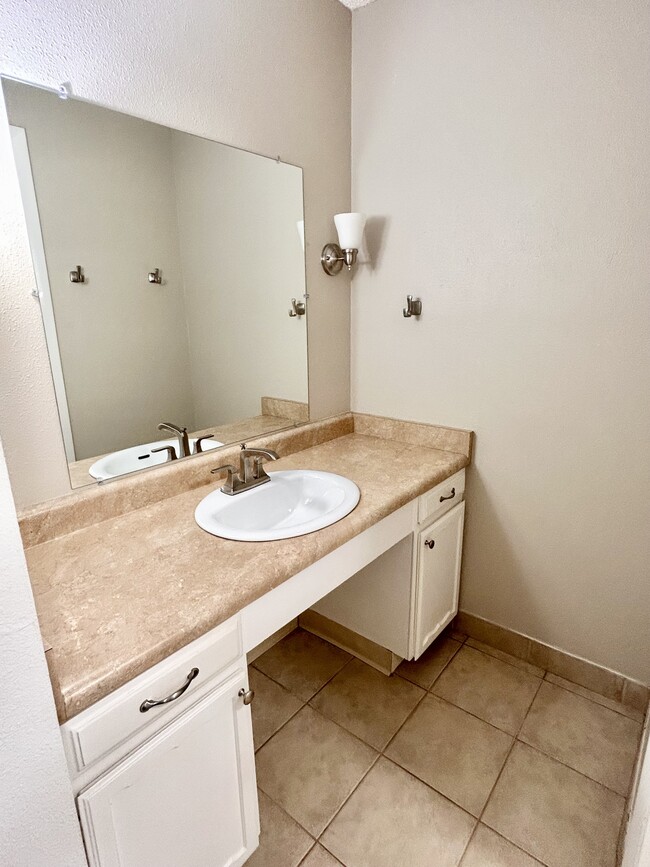 Elevate your morning routine with this stylish bathroom setup. - 5361 Delaware