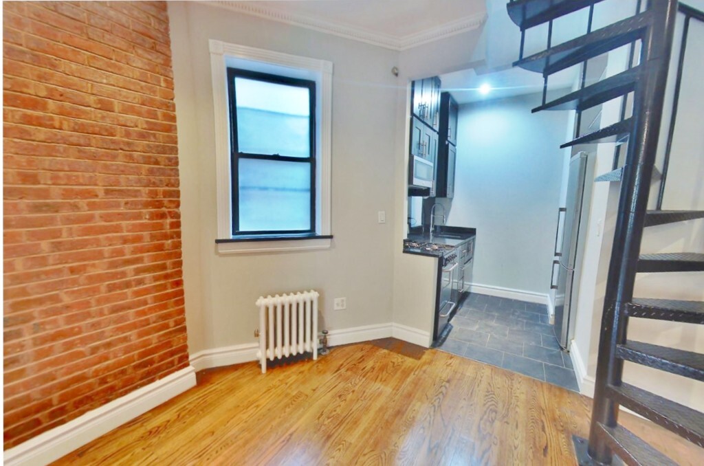 Building Photo - 724 Tenth Ave (49th & 50th St), #5A