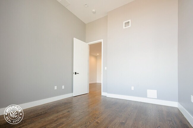 Building Photo - 60-15 Myrtle Ave