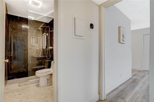Building Photo - Completely Updated and Move-In Ready, 2 bedroom, 1 bath first floor unit!
