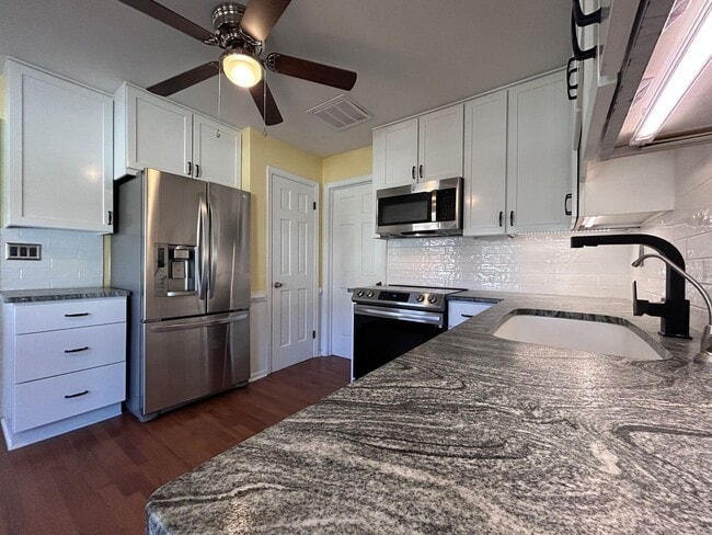 Building Photo - Beautifully Updated Brick Ranch! "ASK ABOU...