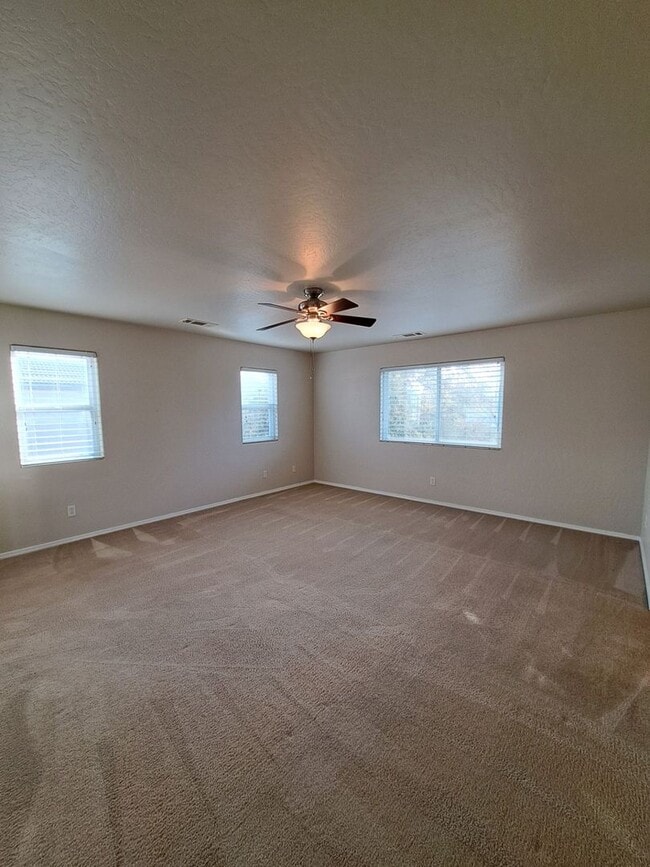 Building Photo - Spacious 2-Story Fresno Home with Bonus Room!