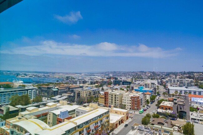 Building Photo - Penthouse Living in Charming Little Italy
