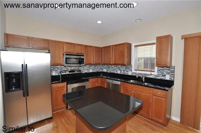 Building Photo - ? Stylish 2-Bedroom Townhome in Prime West Des Moines! Move in Special- May rent free