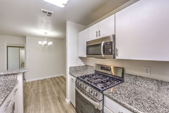 Building Photo - Fully Renovated Canyon Gate Condo | Guard Gated | Resort-Style Living