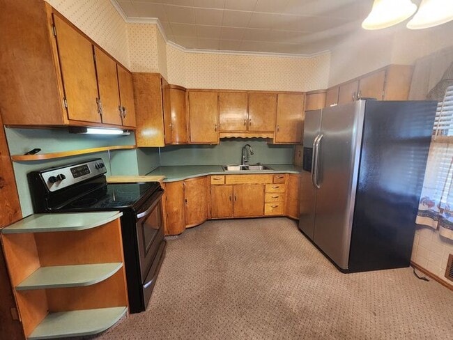 Building Photo - 1 Bedroom House Near Shopping, Parks and Little League Field