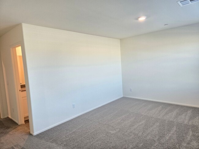 Building Photo - Kalea Trails Gated Cosmos Garden