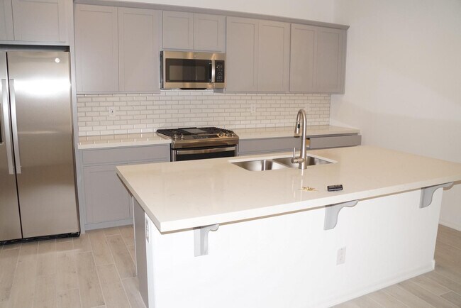Building Photo - 3809 N 100th Dr